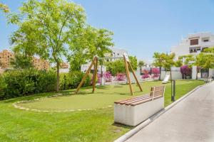 36 Apartment with large garden, pool and padel court in Golf Hills Estepona