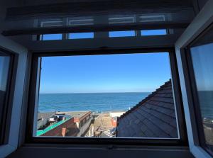 La Mer en Face - Vue sur la mer et les falaises
