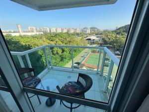 RioStay Apart com varanda em frente Riocentro Farmasi Arena Parque Olímpico Globo Projac