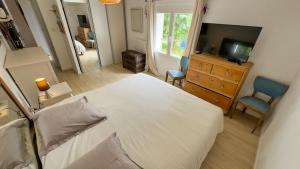 Villas Maison, Piscine, Jardin & Calme : photos des chambres
