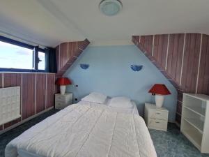 Maisons de vacances Holiday Home on Pink Granite Coast with Sea View : photos des chambres