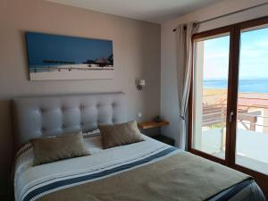 Villas Maison vue sur mer avec piscine : photos des chambres