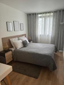 Sejours chez l'habitant Une Chambre dans un appartement : photos des chambres