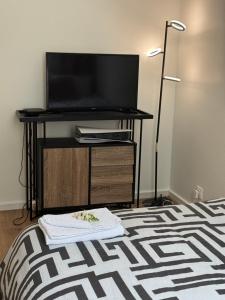 Sejours chez l'habitant Une Chambre dans un appartement : photos des chambres
