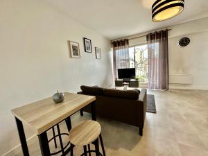 Appartements T1 aux pieds de la Gare Benedictins - DABNB : photos des chambres