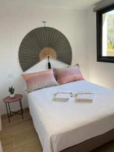 Appartements Un coin de paradis avec vue Mer et jardin : photos des chambres