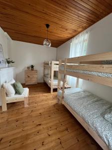 Auberges de jeunesse Maison Eclusiere le Coup de Pompe : Lit dans un dortoir de 4 lits