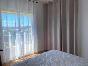 Appartements Charmant T3 avec Clim et WIFI a Balaruc-les-Bains - FR-1-553-262 : photos des chambres