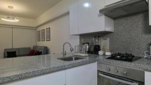 Hermoso departamento con piscina, gimnasio, sala parrillas