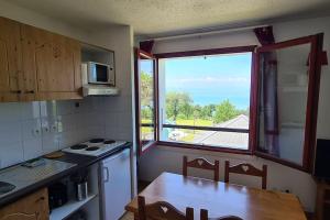 Appart cosy avec vue sur Lac