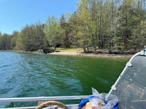 Majas Backe on a island with boat