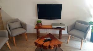 Appartements Vacances a la Campagne 4 etoiles a 30min des pistes de ski Mont Dore Sancy : photos des chambres