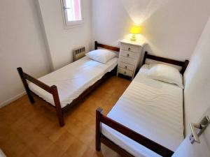 Appartements T3 Duplex a 200 m Plages/Commerces - Parking, Wi-Fi, Piscine, Tennis - Animaux Acceptes - FR-1-316-104 : photos des chambres