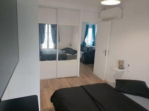 Appartements Meubles de Tourisme a Vincennes : photos des chambres