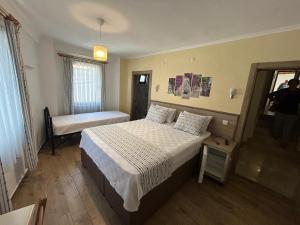 Standard Triple Room room in Bozcaada Hotel Vitis