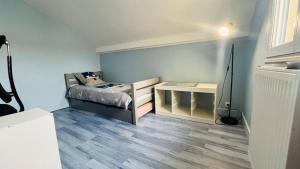 Villas Charmante maison au Nord de Paris piscine chauffee : photos des chambres