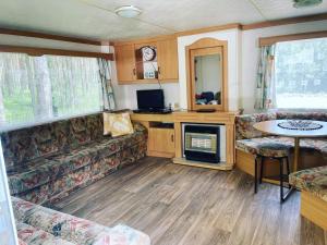 Namelis Pušų pakrašty