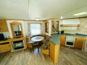 Namelis Pušų pakrašty