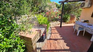 LA TERRAZZA SUL MARE - panoramic cottage overlooking sea and Caprera island in a quiet residential area - 150 mt from the sea