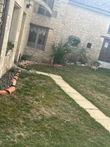 Appartements Charmante maisonnette proche Futuroscope : photos des chambres