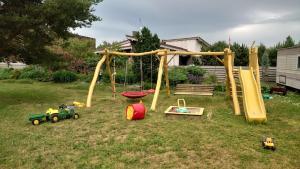 Namelis Pušų pakrašty