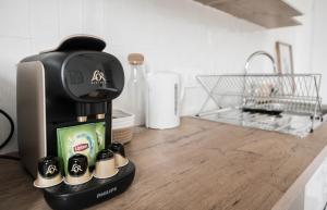 Appartements Chez Nino, un studio lumineux et climatise : photos des chambres