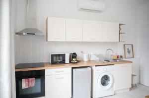 Appartements Chez Nino, un studio lumineux et climatise : photos des chambres