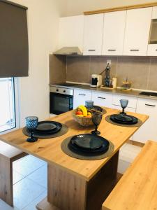 IKIES A&A SUITES & VILLAS