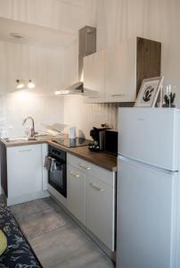 Appartements Le beau Lucien, climatise, central et fonctionnel : photos des chambres