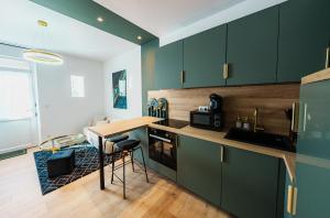 Appartements L-Emeraude : photos des chambres