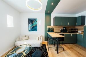 Appartements L-Emeraude : photos des chambres