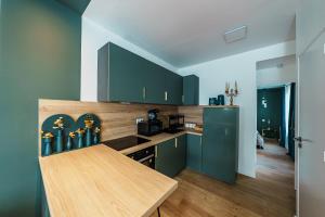 Appartements L-Emeraude : photos des chambres