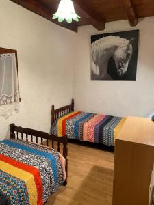 Maisons de vacances Maison pierre avec piscine privee : photos des chambres