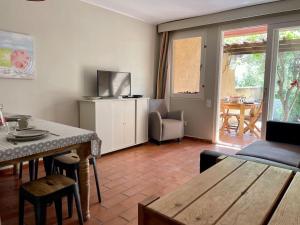 Appartements 4 personnes-clim-piscine-parking : photos des chambres