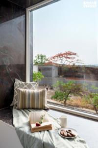 StayVista at Majestic Whispers with Rooftop Pool