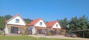 Domki u Eweli CAŁOROCZNE ogrzewane kominkiem