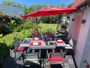 Villas Charmante maison pour vos vacances : photos des chambres