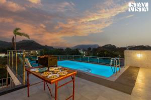 StayVista at Nova Nest with Rooftop Pool