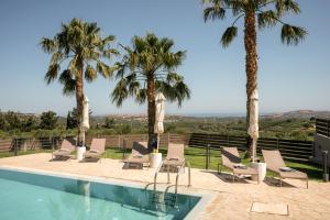 Margarites villas - A Charming Palm Retreat