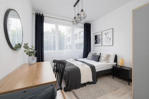 Eklsuzywny Apartament z Parkingiem w Krakowie by Renters Prestige