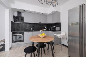 Eklsuzywny Apartament z Parkingiem w Krakowie by Renters Prestige