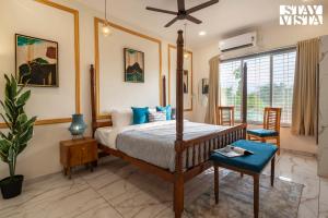 StayVista at Rio Vista with Pool, Lawn, Music Speaker & Game