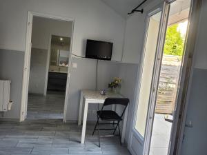 Appartements Petite Maison avec son jardin et acces independant a 14 mn de paris : photos des chambres
