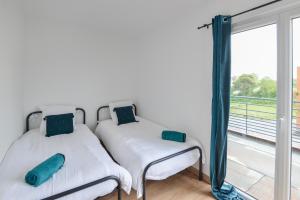 Maisons de vacances Le D-Day - Sauna - A moins de 2 km de la plage : photos des chambres