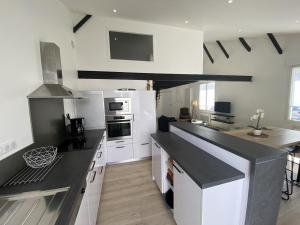 Maison style loft plein centre ville