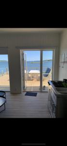 Bryggstuga med privat bastu