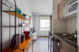 Appartements The Cute Sans-Souci Studio : photos des chambres
