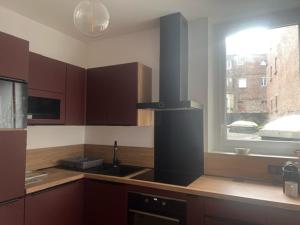 Appartements Sherlock Home : photos des chambres