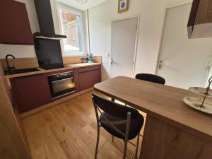 Appartements Sherlock Home : photos des chambres