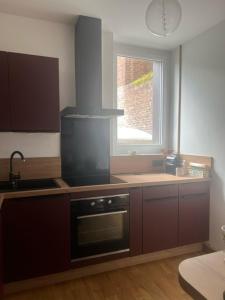 Appartements Sherlock Home : photos des chambres